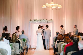 Wedding ceremony in Ballroom North at Hazeltine National Golf Club