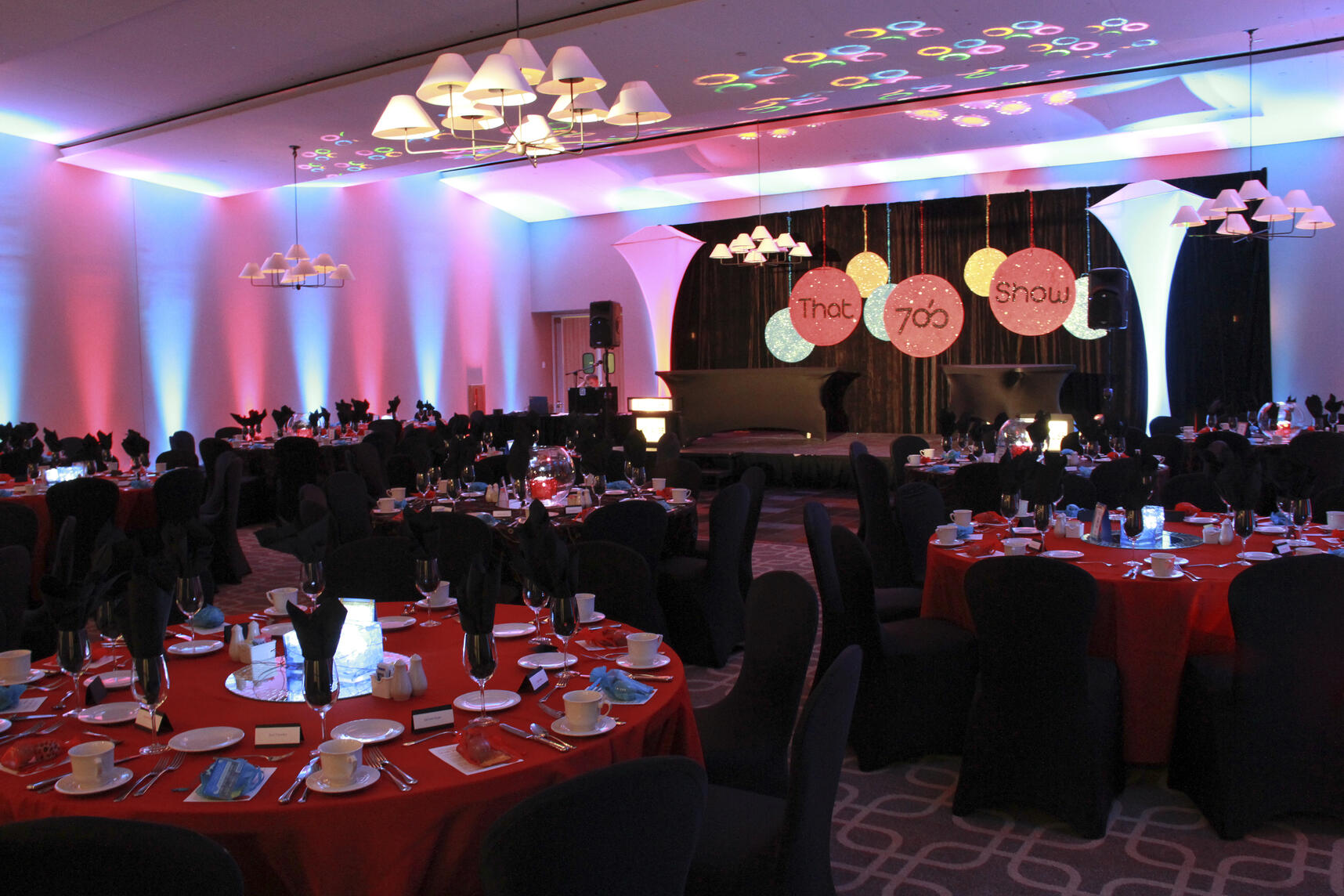 Game Show Themed Fundraising Gala in the ballroom at Hazeltine National Golf Club