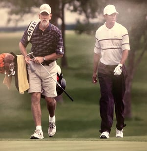 Jim Arnold with Tiger Woods