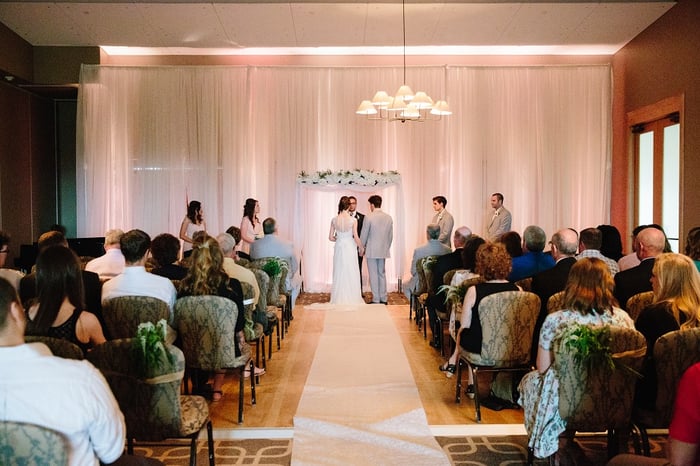 Wedding ceremony in Ballroom North at Hazeltine National Golf Club