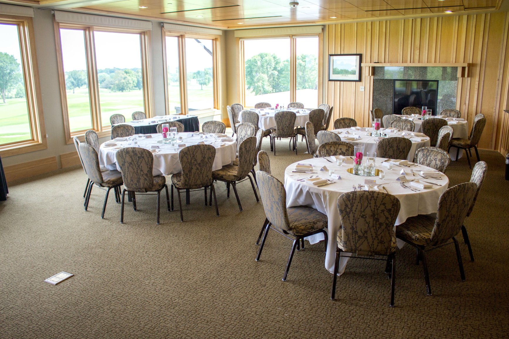 Team banquet at Hazeltine National Golf Club with views of the golf course
