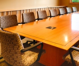 Business meeting in the boardroom overlooking the golf course at Hazeltine national Golf Club