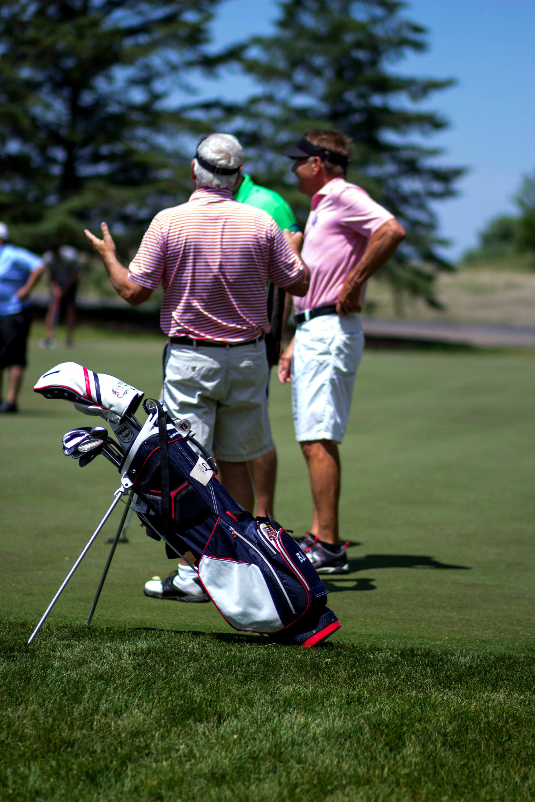 Business networking during a Links and Drinks golf clinic at Hazeltine National Golf Club