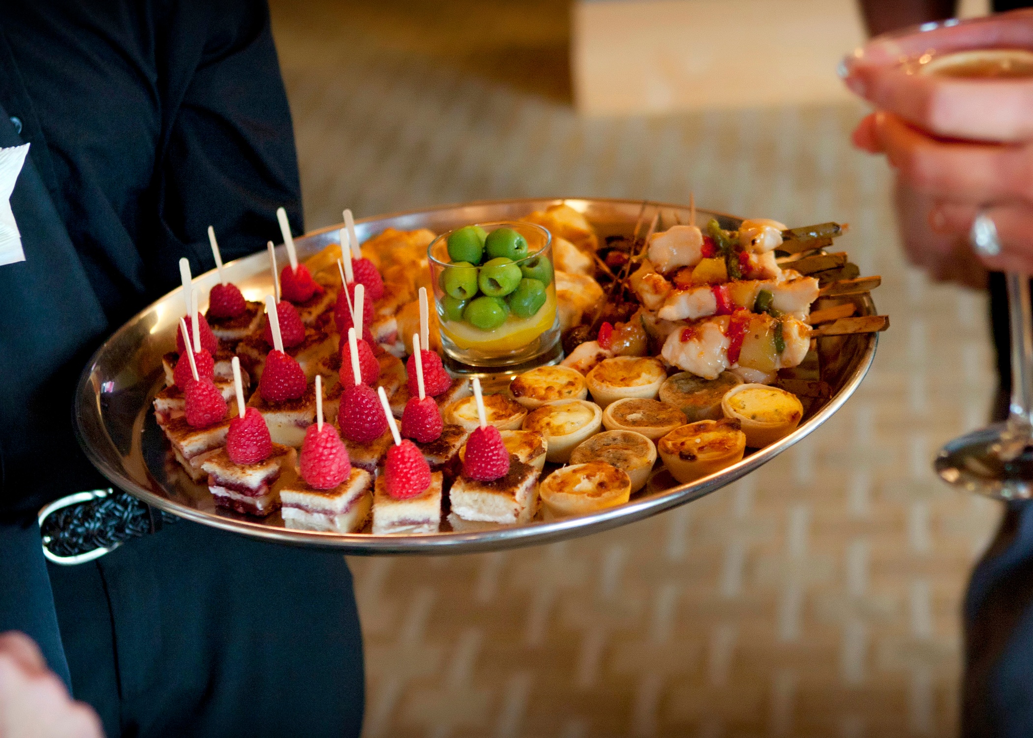 Golfers enjoy a variety of appetizers after a networking event at Hazeltine National Golf Club