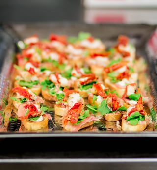 Bruschetta is served during the cocktail reception after a private golf tournament at Hazeltine National Golf Club